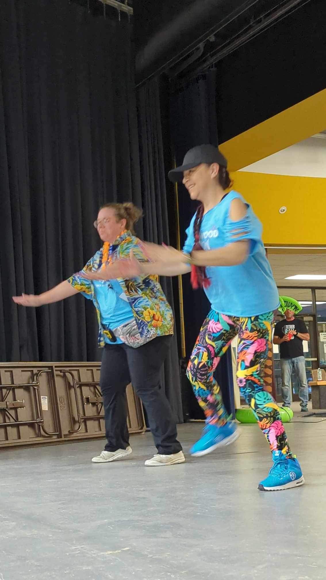 Zumba with Geovy dancing at a community event