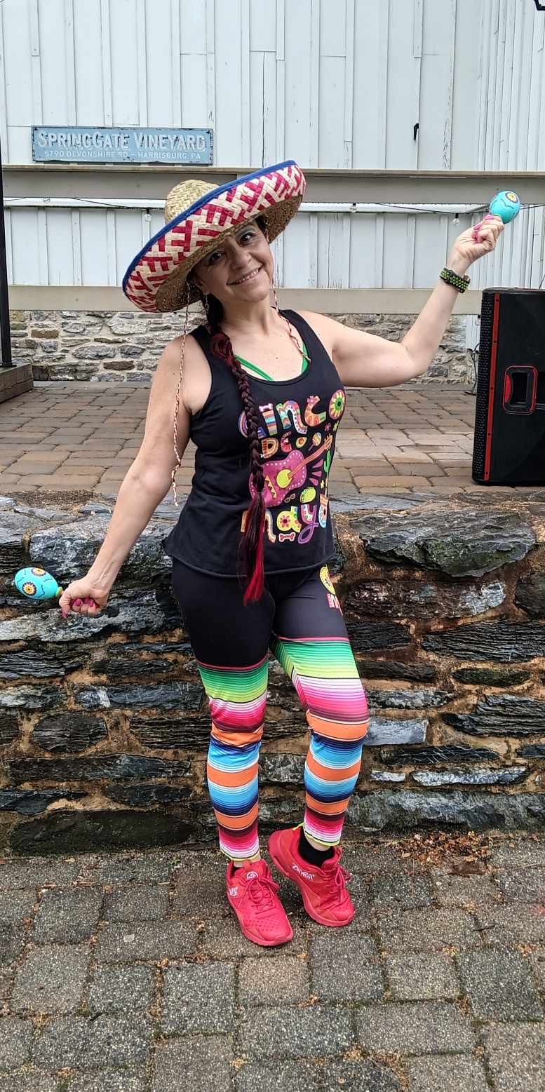 Outdoor Zumba celebration with maracas